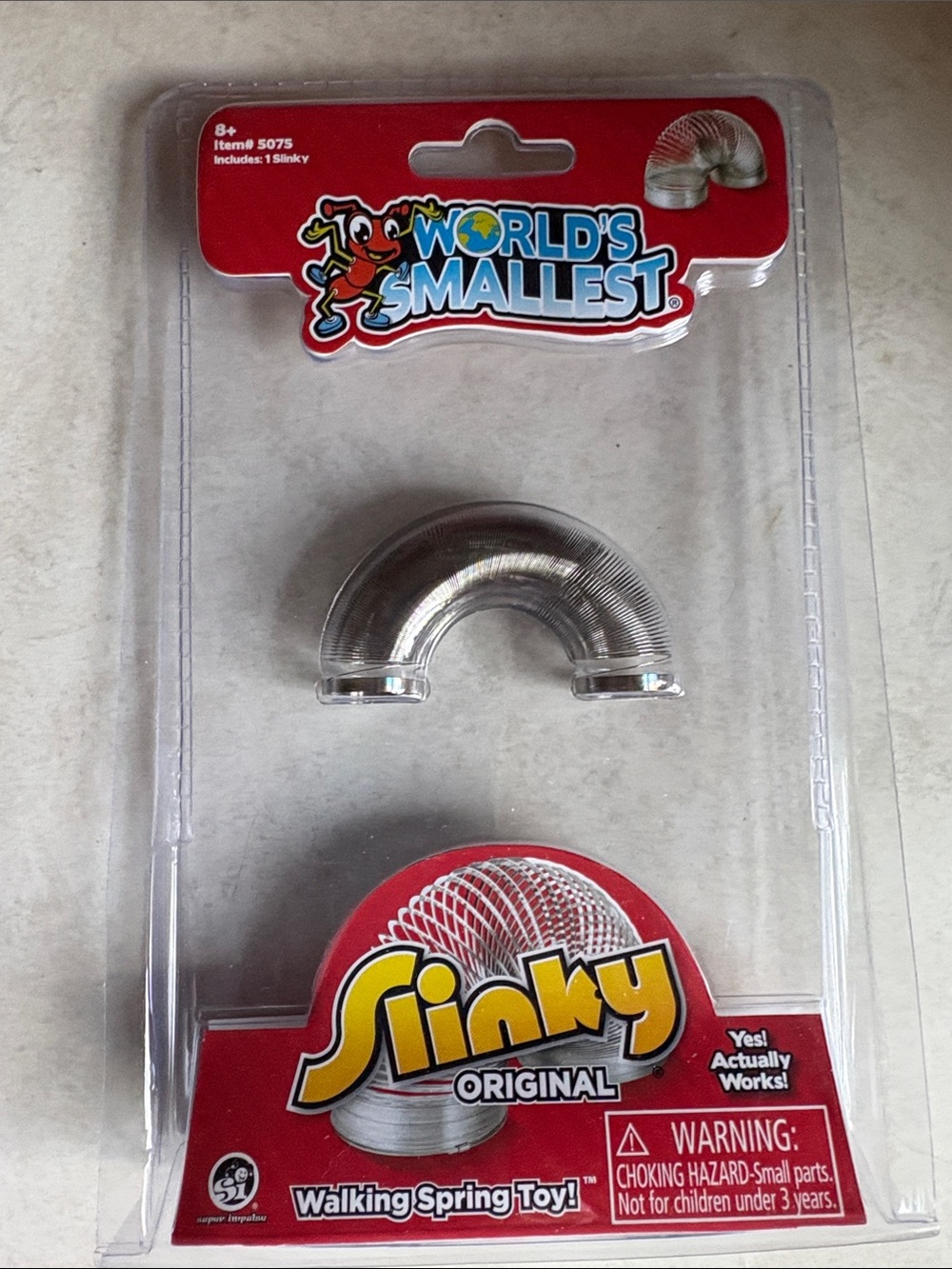BNIB World's Smallest Slinky (really works)